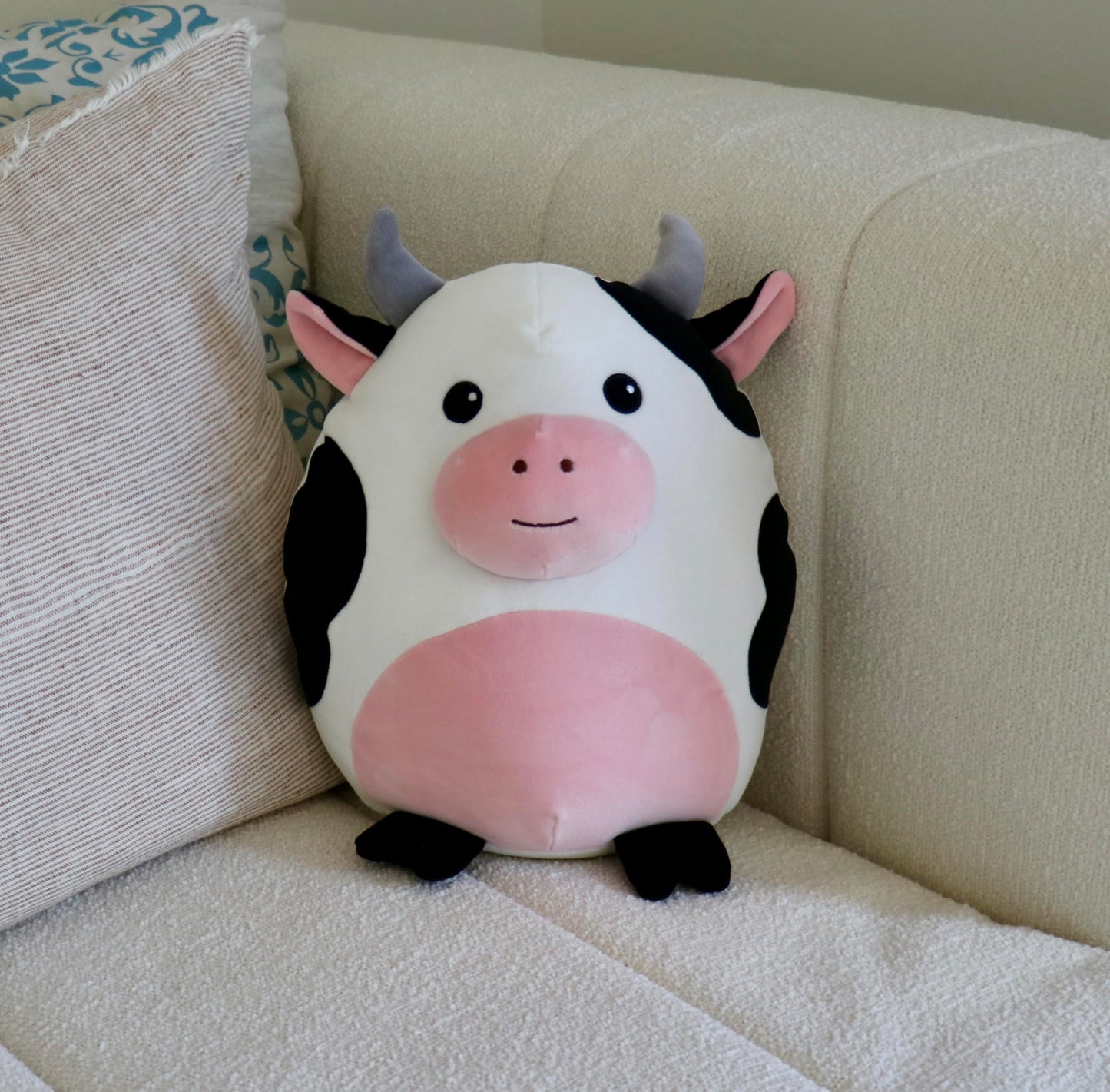Snuggaboos Daisy The Cow Squish: 13-Inch Original Super Soft Plush Pillow Toy โ Adorable and Cuddly Cow Stuffed Animal Plushie for All Ages for Kids and Adults
