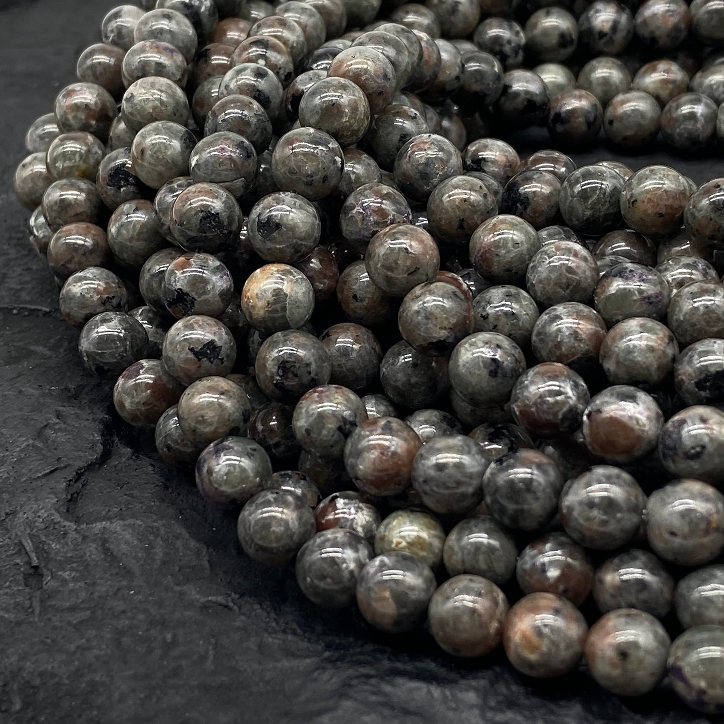 ABCGEMS (UV Glowing Rock - Authentic USA-Sourced) American Smoky Yooperlite Beads from Lake Superior (Flashing Flame Under Ultraviolet) DIY Jewelry Making Smooth Round 10mm