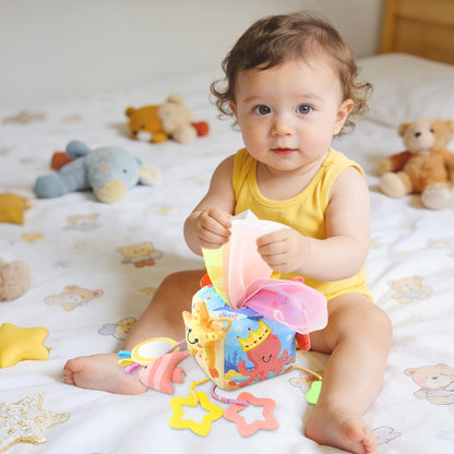 Caterbee Baby Sensory Tissue Box Toy with Hanging Hook – Pull Out Fabric Tissues, Rattle & Teether, Montessori Stroller & Car Seat Toy for Infants (Ocean)