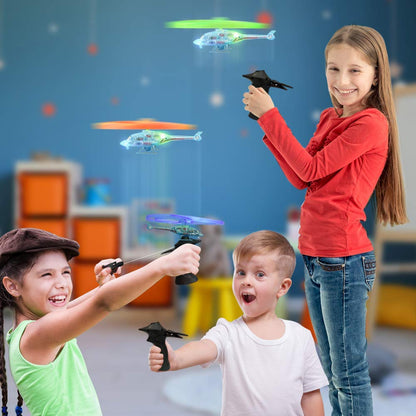 ArtCreativity Light Up Flying Helicopter Toys for Kids – Set of 2 with LED Lights, Handheld Launcher, Soars Over 8 Feet – Outdoor Indoor Party Favors, Birthday Gifts for Boys & Girls Ages 3+
