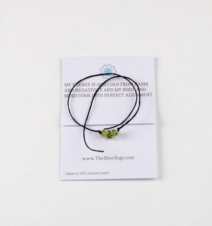 The Blue Yogi Healing band -2 in 1 protection Bracelet/Anklet with an affirmation- Tie Closure (Peridot)