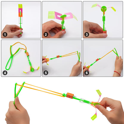 Rocket Slingshot Flying with LED Lights Glow The Dark Party,12 Launchers + 12 LED Helicopters,Slingshot Amazing Arrow Helicopter Glow Supplies for Kids (24 Pieces)