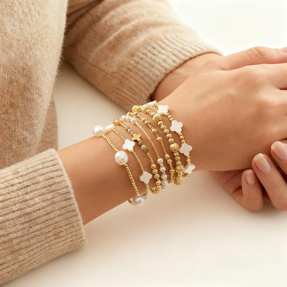 SHINUS BOHO 14K Gold White Beaded Clover Pearl Fall Bracelet Stack for Women,7PCS Bohemian Cross Beads Stretch Stackable Bracelets Set Fashion Holiday Birthday Prom Jewelry Accessories Gift Friendship Sister