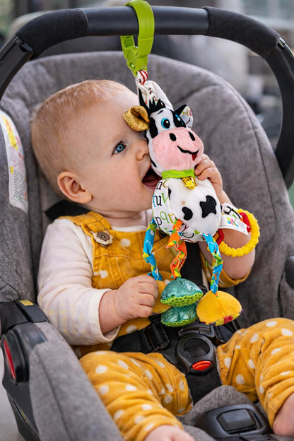 Balibazoo Caesar The Cow Hanging Toy - Developmental Sensory Rattle for Babies 0-24 Months | Vibrating Pull, Crinkle Sounds, BPA-Free Teether | Clips to Stroller, Car Seat | Soft Plush Baby Toy