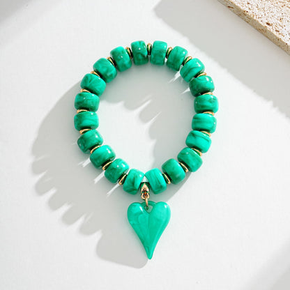 YUJIE Western Turquoise Beaded Bracelet with Heart Charm, Boho Handmade Acrylic Beaded Stretch Country Cowgirl Bracelet for Women, Vinatge Jewelry Gift