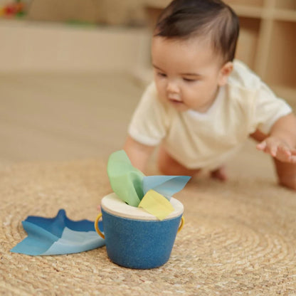 PlanToys® Wooden Baby Tissue Box Toy for Infants & Toddlers | Fine Motor Skill Activity with Cloth Pieces | Object Permanence Learning Toy | Montessori Sensory Educational Gift