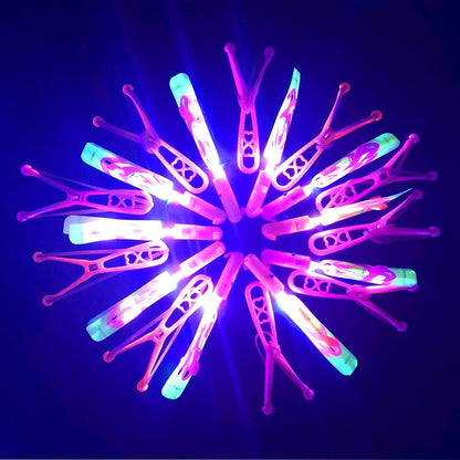JX 24 Pack Rocket Slingshot Flying Toys with Led Lights,24Pcs LED Arrow Helicopters + 24Pcs Launchers,Summer Outdoor Game LED Slingshot Toy for Kids, Glow in The Dark Kids Party Supplies