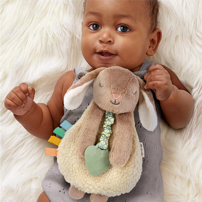 Itzy Ritzy - Itzy Lovey Including Teether - Baby Lovey with Teether, Textured Ribbons & Dangle Arms - Features Crinkle Sound, Sherpa Fabric and Minky Plush (Taupe Bunny)