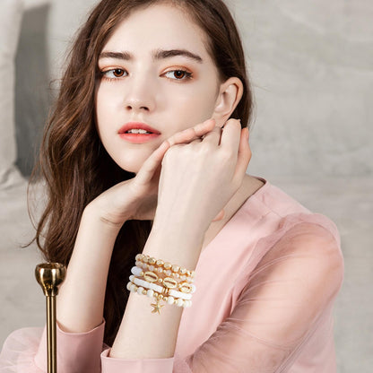 GOOJIDS Surfer Heishi Clay Bead Bracelets for Women Starfish Stackable Gold Plated Beaded Stretch Bracelets Elastic Layering Friendship Bracelets Set Jewelry