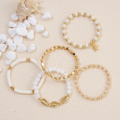 GOOJIDS Surfer Heishi Clay Bead Bracelets for Women Starfish Stackable Gold Plated Beaded Stretch Bracelets Elastic Layering Friendship Bracelets Set Jewelry