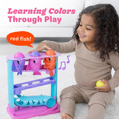 Move2Play, Feed The Fish | 30+ Fin-Tastic Songs & Phrases | Baby & Toddler Musical Toy | First Birthday Present for 1+ Year Old | Ages 6-24 Months | Boy & Girl Ball Drop Toy