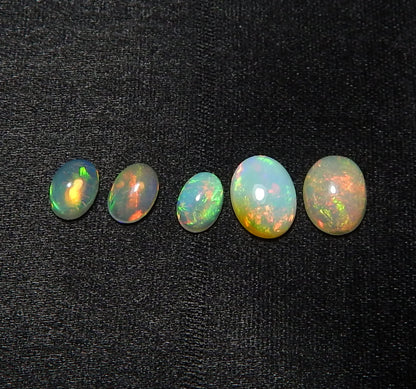 Myhealingworld Natural Ethiopian Opal 4x6mm 6x8mm oval cabochon AAA quality loose calibrated gemstones for jewelry making oval 4x6mm = 3 pcs 6x8mm = 2 pcs