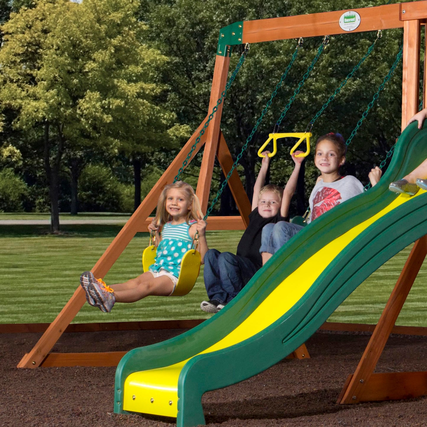 Backyard Discovery Tanglewood Cedar Wood Swing Set with Wave Slide, Clubhouse, Playhouse, Covered Snack Bar Window, Bench, Rock Wall Ladder, Belt Swings, Trapeze, Porch, Step Ladder, Outdoor Playset