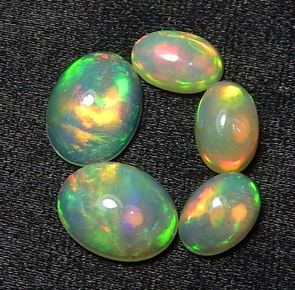 Myhealingworld Natural Ethiopian Opal 4x6mm 6x8mm oval cabochon AAA quality loose calibrated gemstones for jewelry making oval 4x6mm = 3 pcs 6x8mm = 2 pcs