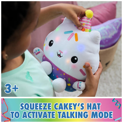 Gabby's Dollhouse Celebrations, Sprinkle Party Cakey Cat Plush, 10-Inch Interactive Stuffed Animal with Sounds, Kids Toys for Girls & Boys Ages 3+