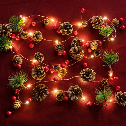 Christmas Garland with Lights, 6.6FT Pinecones Christmas String Lights with Red Berries, Bells & Needles, 20 LED Battery Operated Prelit Garland for Christmas Decorations Indoor/Outdoor (Warm White)
