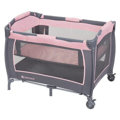 Baby Trend Passport Carriage Travel System with Bassinet, Changing Table, Toys, and Music Center, Dash Pink