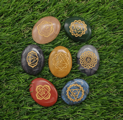 Amazing Gemstone 7 Chakra Oval Set Reiki Healing Crystal with Engraved Chakra OM Symbols Holistic Balancing Polished Palm Stones Set with Velvet Pouch