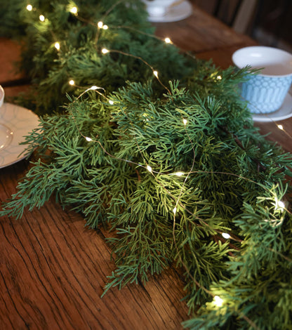 6FT Christmas Garland PARTY JOY Cedar Garland with 9.8FT LED String Lights, Greenery Plant for Christmas Decorations Table Mantle Background Wall Room Outdoor Indoor Winter Decoration