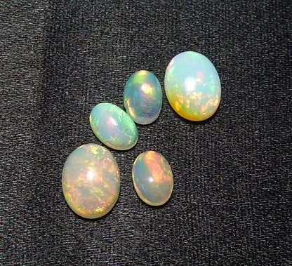 Myhealingworld Natural Ethiopian Opal 4x6mm 6x8mm oval cabochon AAA quality loose calibrated gemstones for jewelry making oval 4x6mm = 3 pcs 6x8mm = 2 pcs