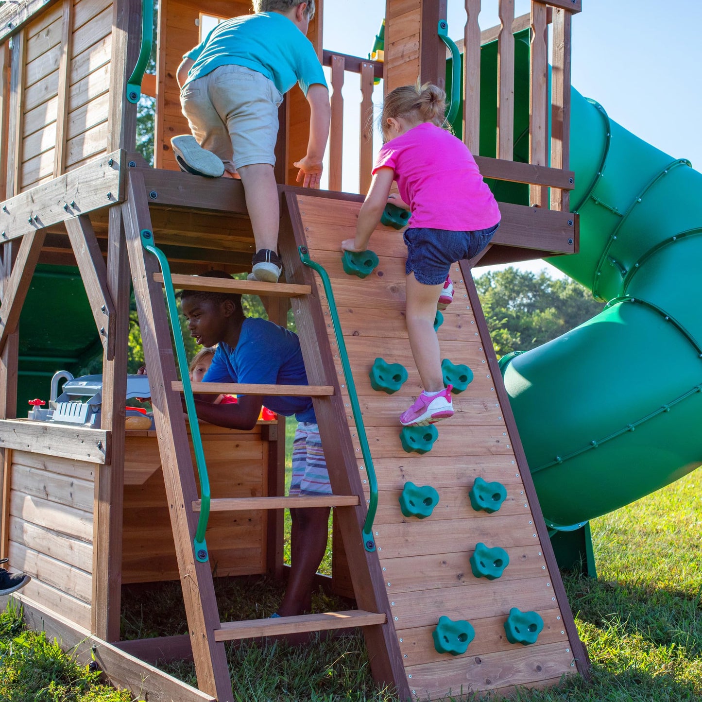 Backyard Discovery Cedar Cove Wood Swing Set with Spiral Tube and Wave Slide, Clubhouse, Toy Grill, Snack Bar, Rock Wall, Belt Swings, Web Swing, Balcony,Chalkboard, Ladder,Outdoor Playset 10 Years