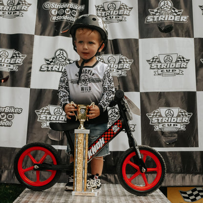 Strider 12” Sport Bike, Black - No Pedal Balance Bicycle for Kids 1 to 4 Years - Includes Safety Pad, Padded Seat, Mini Grips & Flat-Free Tires - Tool-Free Assembly & Adjustments
